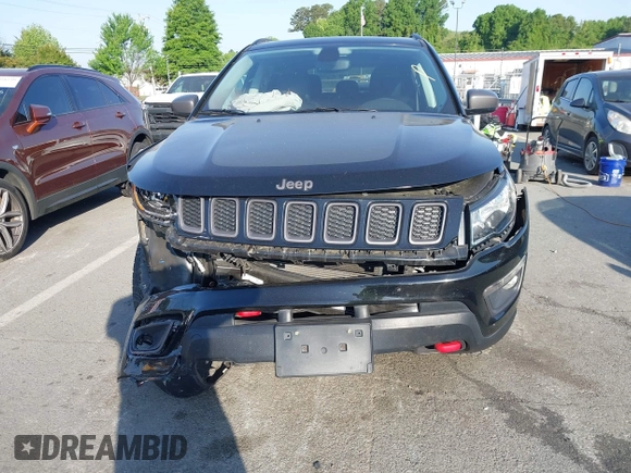 2019 Jeep Compass Trailhawk with VIN 3C4NJDDB5KT800515, listed as a IAAI auction lot 42059594 with 60,338 mi miles and . Bid and sale history available at DreamBid. Image 12.