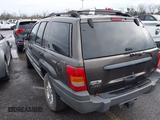 2000 Jeep Grand Cherokee Laredo with VIN 1J4GW48N2YC187623, listed as a IAAI auction lot 41311495 with 121,831 mi miles and . Bid and sale history available at DreamBid. Image 3.