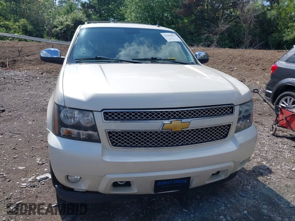 2013 Chevrolet Tahoe LTZ with VIN 1GNSKCE07DR326996, listed as a IAAI auction lot 42203073 with 147,067 mi miles and . Bid and sale history available at DreamBid. Image 12.