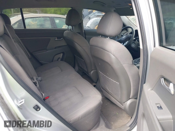 2011 Kia Sportage LX with VIN KNDPB3A23B7053943, listed as a IAAI auction lot 42063941 with 234,364 mi miles and . Bid and sale history available at carsss.com. Image 8.