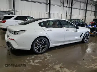 2022 BMW 8 Series 840i with VIN WBAGV4C06NCH11761, listed as a Copart auction lot 79094614 with 37,994 mi miles and Salvage title. Bid and sale history available at DreamBid. Image 3.