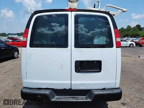 2015 Chevrolet Express Cargo with VIN 1GCWGFCF0F1248728, listed as a IAAI auction lot 42561489 with 263,640 mi miles and . Bid and sale history available at DreamBid. Image 3.
