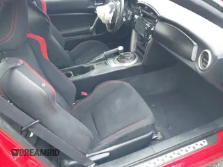 2014 Scion FR-S z VIN JF1ZNAA17E8702482, wystawiony jako IAAI lot #41582768 z przebiegiem 117 193 mil mil oraz . Historia ofert i sprzedaży dostępna na DreamBid. Obrazek 5.
