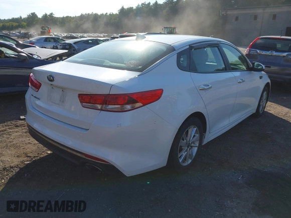 2016 Kia Optima LX with VIN 5XXGT4L39GG058653, listed as a IAAI auction lot 40313026 with 94,933 mi miles. Bid and sale history available at carsss.com. Image 4.