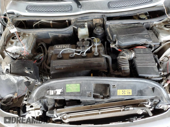 2004 MINI Hardtop with VIN WMWRC33404TJ58046, listed as a Copart auction lot 46358625 with 140,934 mi miles and Salvage Title. Bid and sale history available at DreamBid. Image 12.