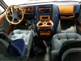 1990 GMC Vandura z VIN 1GDEG25K8L7521773, wystawiony jako Copart lot #84875104 z przebiegiem 171 457 mil mil oraz Tytuł czysty. Historia ofert i sprzedaży dostępna na DreamBid. Obrazek 8.