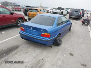 1999 BMW 3 Series M3 with VIN WBSBG9336XEY80979, listed as a IAAI auction lot 41179676 with 262,233 mi miles. Bid and sale history available at carsss.com. Image 4.