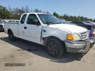 2004 Ford F-150 XL with VIN 2FTRX17W54CA63466, listed as a Copart auction lot 64022895 with 329,377 mi miles and Salvage title. Bid and sale history available at DreamBid. Image 4.