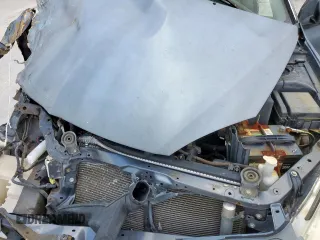 2006 Mitsubishi Lancer ES z VIN JA3AJ26EX6U067642, wystawiony jako Copart lot #56035945 z przebiegiem 163 060 mil mil oraz Szkoda całkowita • Salvage title. Historia ofert i sprzedaży dostępna na DreamBid. Obrazek 11.