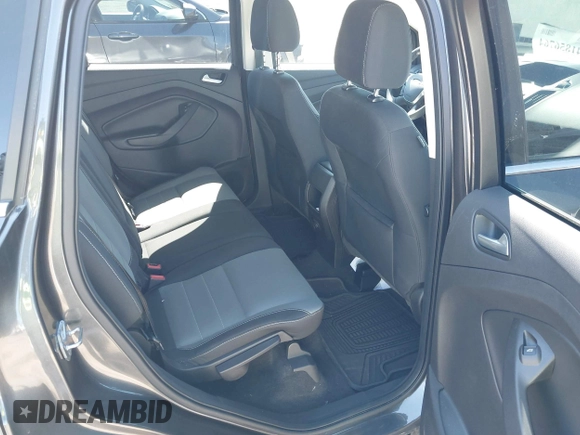 2016 Ford Escape SE with VIN 1FMCU9GX7GUA58243, listed as a IAAI auction lot 41856764 with 50,129 mi miles and . Bid and sale history available at DreamBid. Image 8.