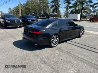 2018 Audi S6 Premium Plus z VIN WAUFFAFC6JN000859, wystawiony jako Copart lot #58193725 z przebiegiem 120 327 mil mil oraz Tytuł czysty. Historia ofert i sprzedaży dostępna na DreamBid. Obrazek 4.