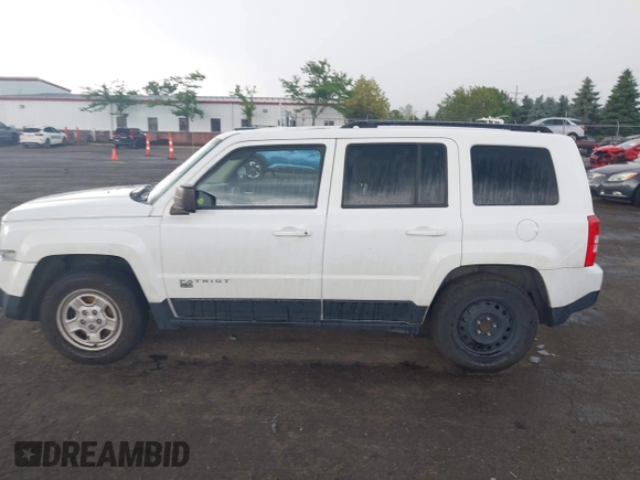 2013 Jeep Patriot Sport with VIN 1C4NJPBA8DD115719, listed as a IAAI auction lot 42591934 with 196,844 mi miles and . Bid and sale history available at DreamBid. Image 14.