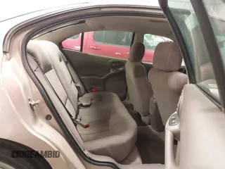2004 Pontiac Grand Am SE1 with VIN 1G2NF52E04M704082, listed as a IAAI auction lot 41536059 with 207,958 mi miles. Bid and sale history available at carsss.com. Image 8.
