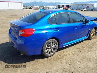 2016 Subaru WRX with VIN JF1VA1B68G9803936, listed as a IAAI auction lot 42108121 with 113,416 mi miles. Bid and sale history available at carsss.com. Image 4.