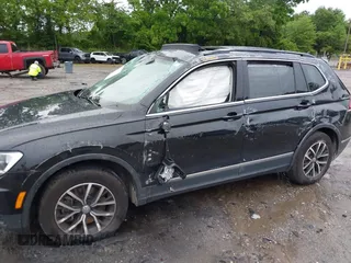 2021 Volkswagen Tiguan SE with VIN 3VV3B7AX6MM021502, listed as a IAAI auction lot 42243705 with 60,988 mi miles and . Bid and sale history available at DreamBid. Image 6.