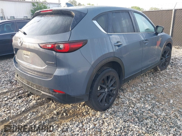 2024 Mazda CX-5 2.5 S Carbon Edition with VIN JM3KFBCL1R0502108, listed as a IAAI auction lot 42118496 with 31,054 mi miles. Bid and sale history available at carsss.com. Image 4.