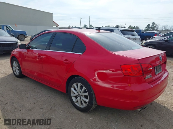 2014 Volkswagen Jetta Sedan SE w/Connectivity with VIN 3VWD07AJ8EM433021, listed as a IAAI auction lot 41695648 with 186,984 mi miles. Bid and sale history available at carsss.com. Image 3.