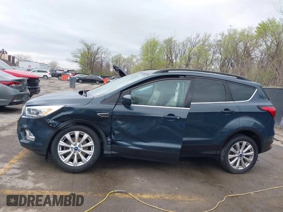 2019 Ford Escape SEL with VIN 1FMCU9HD3KUA54073, listed as a IAAI auction lot 41917955 with 101,283 mi miles. Bid and sale history available at carsss.com. Image 6.