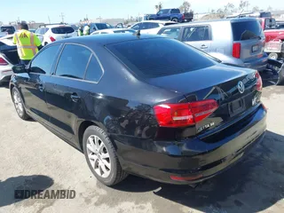 2015 Volkswagen Jetta Sedan 1.8T SE with VIN 3VWD17AJ6FM235908, listed as a IAAI auction lot 42015028 with 178,814 mi miles. Bid and sale history available at carsss.com. Image 3.