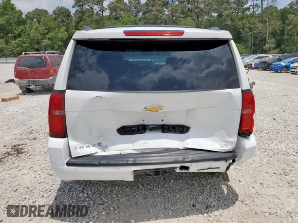 2019 Chevrolet Tahoe LT with VIN 1GNSCBKC1KR226315, listed as a Copart auction lot 57215915 with 153,170 mi miles and Salvage title. Bid and sale history available at DreamBid. Image 6.