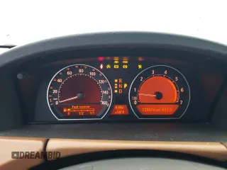 2006 BMW 7 Series 750i with VIN WBAHL83586DT05258, listed as a Copart auction lot 77033744 with 129,376 mi miles and Salvage Title. Bid and sale history available at carsss.com. Image 9.