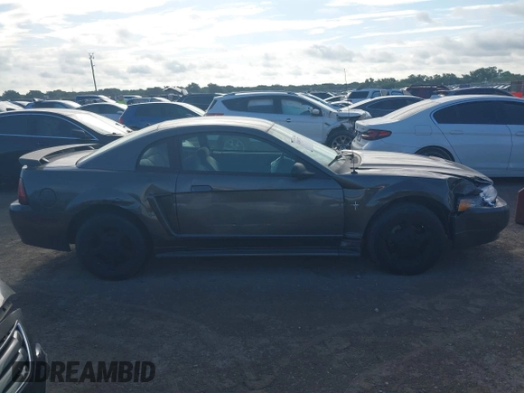 2003 Ford Mustang Standard z VIN 1FAFP40463F341216, wystawiony jako IAAI lot #42601357 z przebiegiem 145 520 mil mil oraz . Historia ofert i sprzedaży dostępna na DreamBid. Obrazek 13.