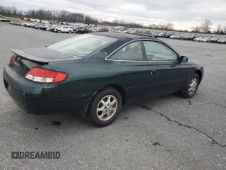 2001 Toyota Solara SE with VIN 2T1CG22P41C458632, listed as a Copart auction lot 86082504 with 199,972 mi miles and Salvage Title. Bid and sale history available at carsss.com. Image 3.