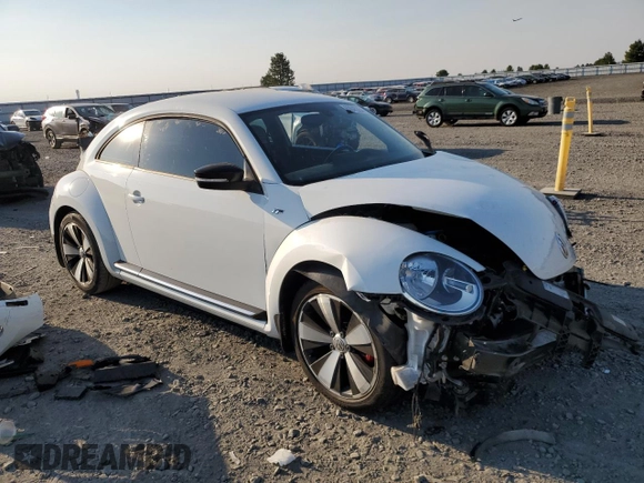 2016 Volkswagen Beetle Turbo R-Line with VIN 3VWVT7AT9GM602303, listed as a Copart auction lot 63845354 with 65,796 mi miles and Salvage Title. Bid and sale history available at DreamBid. Image 4.