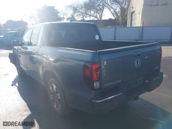 2017 Honda Ridgeline RTL-E with VIN 5FPYK3F77HB012606, listed as a IAAI auction lot 41409677 with 93,943 mi miles. Bid and sale history available at carsss.com. Image 3.