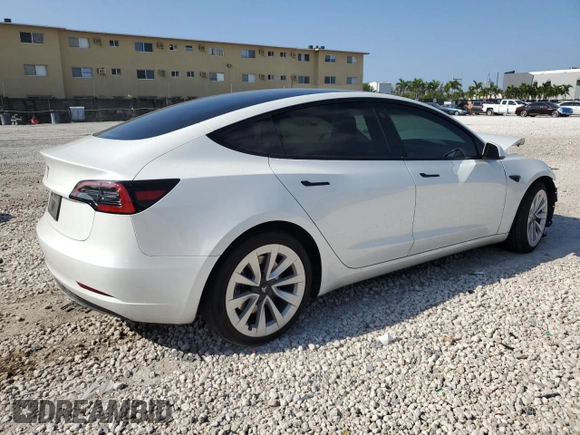 2023 Tesla Model 3 with VIN 5YJ3E1EA6PF510323, listed as a Copart auction lot 52094495 with 115,928 mi miles and Salvage Title. Bid and sale history available at DreamBid. Image 3.