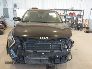 2023 Kia Sportage EX with VIN KNDPVCAG8P7095454, listed as a IAAI auction lot 42335661 with 96,718 mi miles and . Bid and sale history available at DreamBid. Image 13.