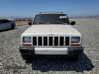 2000 Jeep Cherokee with VIN 1J4FT48S6YL152495, listed as a Copart auction lot 60627965 with 196,086 mi miles and Salvage title. Bid and sale history available at DreamBid. Image 5.