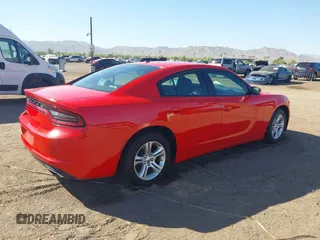 2022 Dodge Charger SXT with VIN 2C3CDXBG8NH208316, listed as a IAAI auction lot 42099897 with 47,596 mi miles and . Bid and sale history available at carsss.com. Image 4.
