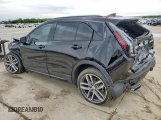 2020 Cadillac XT4 AWD Sport z VIN 1GYFZFR40LF019359, wystawiony jako Copart lot #55651105 z przebiegiem 57 531 mil mil oraz Szkoda całkowita • Salvage title. Historia ofert i sprzedaży dostępna na DreamBid. Obrazek 2.