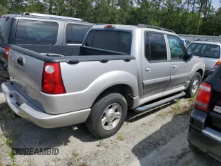 2004 Ford Explorer Sport Trac XLS with VIN 1FMZU67K24UB65144, listed as a Copart auction lot 52611305 with 211,806 mi miles and Salvage title. Bid and sale history available at DreamBid. Image 3.