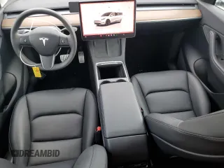 2022 Tesla Model Y Performance with VIN 7SAYGDEF1NF445085, listed as a Copart auction lot 58809495 with 14,832 mi miles and Salvage title. Bid and sale history available at DreamBid. Image 8.