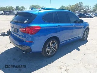 2017 BMW X1 sDrive28i with VIN WBXHU7C31H5H33281, listed as a IAAI auction lot 41814792 with 55,756 mi miles. Bid and sale history available at carsss.com. Image 4.