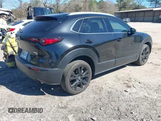2022 Mazda CX-30 2.5 Turbo Premium Package with VIN 3MVDMBDY4NM446866, listed as a IAAI auction lot 41704578 with 24,360 mi miles. Bid and sale history available at carsss.com. Image 4.