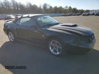 2004 Ford Mustang GT Deluxe z VIN 1FAFP45X14F206570, wystawiony jako Copart lot #48405375 z przebiegiem 103 563 mil mil oraz Szkody całkowita. Historia ofert i sprzedaży dostępna na DreamBid. Obrazek 4.