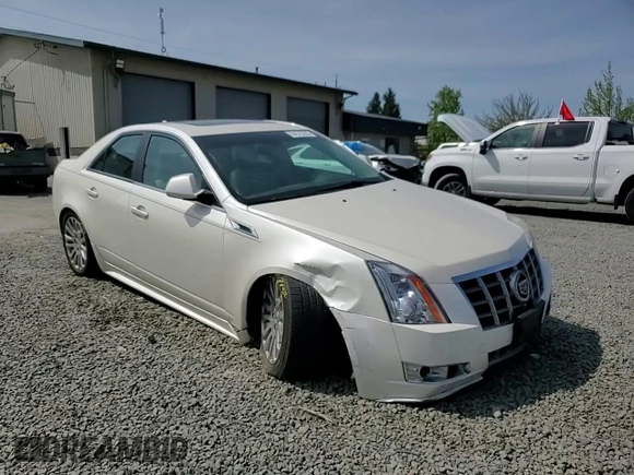 2012 Cadillac CTS Performance z VIN 1G6DM5E36C0157741, wystawiony jako Copart lot #54515235 z przebiegiem 111 283 mil mil oraz Szkoda całkowita • Salvage title. Historia ofert i sprzedaży dostępna na DreamBid. Obrazek 13.