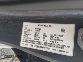 2022 Tesla Model 3 Long Range with VIN 5YJ3E1EB9NF117339, listed as a Copart auction lot 55659415 with 87,479 mi miles and Salvage Title. Bid and sale history available at DreamBid. Image 12.
