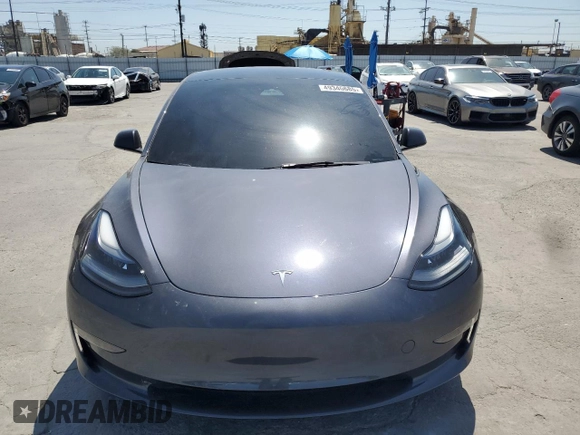 2023 Tesla Model 3 with VIN 5YJ3E1EA8PF616210, listed as a Copart auction lot 49340685 with 38,483 mi miles and Salvage Title. Bid and sale history available at DreamBid. Image 5.
