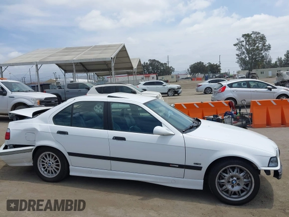 1998 BMW M3 with VIN WBSCD9329WEE07762, listed as a IAAI auction lot 42239221 with Not provided miles and . Bid and sale history available at DreamBid. Image 14.