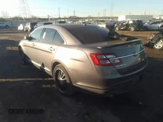 2014 Ford Taurus SHO with VIN 1FAHP2KT4EG140364, listed as a IAAI auction lot 35451709 with 82,904 mi miles. Bid and sale history available at carsss.com. Image 3.