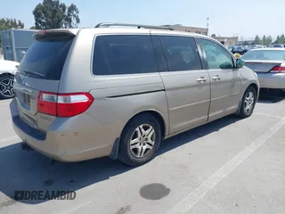 2005 Honda Odyssey EX-L with VIN 5FNRL38705B087733, listed as a IAAI auction lot 42165084 with 254,357 mi miles. Bid and sale history available at carsss.com. Image 4.