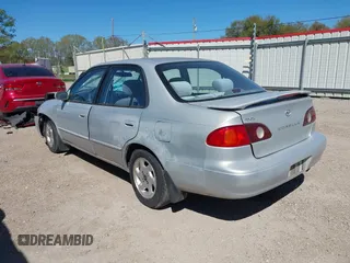 2002 Toyota Corolla CE with VIN 1NXBR12E92Z654340, listed as a IAAI auction lot 41805390 with 62,899 mi miles and . Bid and sale history available at DreamBid. Image 3.