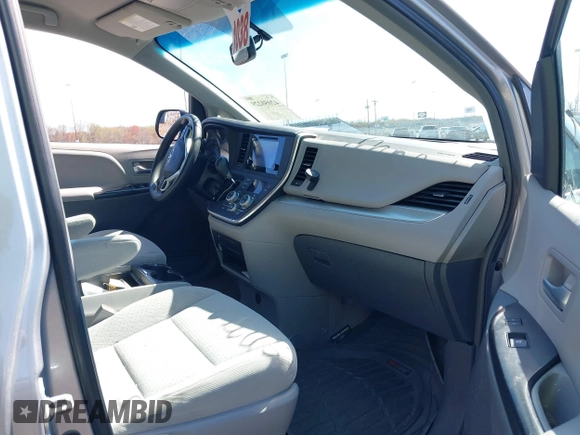 2015 Toyota Sienna LE AAS with VIN 5TDKK3DC0FS663826, listed as a IAAI auction lot 42050229 with 126,971 mi miles and . Bid and sale history available at DreamBid. Image 5.