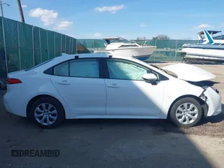 2023 Toyota Corolla Hybrid LE with VIN JTDBCMFE1PJ012186, listed as a IAAI auction lot 41807936 with 47,307 mi miles and . Bid and sale history available at carsss.com. Image 13.
