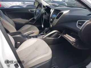 2012 Hyundai Veloster w/Gray Int с VIN KMHTC6ADXCU027658, выставлен на аукционе IAAI как лот 41517929 с пробегом 142 884 миль миль и . История ставок и продаж доступна на DreamBid. Изображение 5.