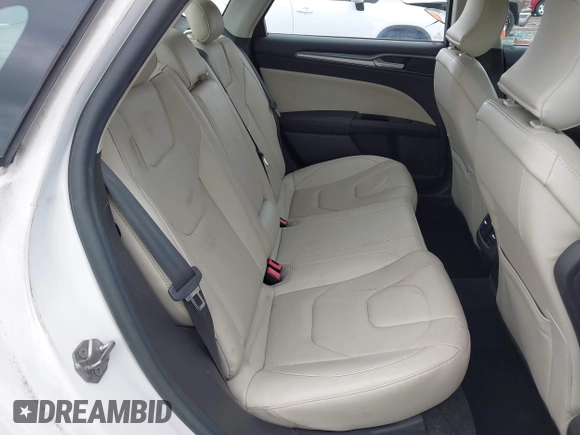 2016 Ford Fusion Titanium with VIN 3FA6P0SU5GR287017, listed as a IAAI auction lot 42316622 with 97,000 mi miles and . Bid and sale history available at DreamBid. Image 8.